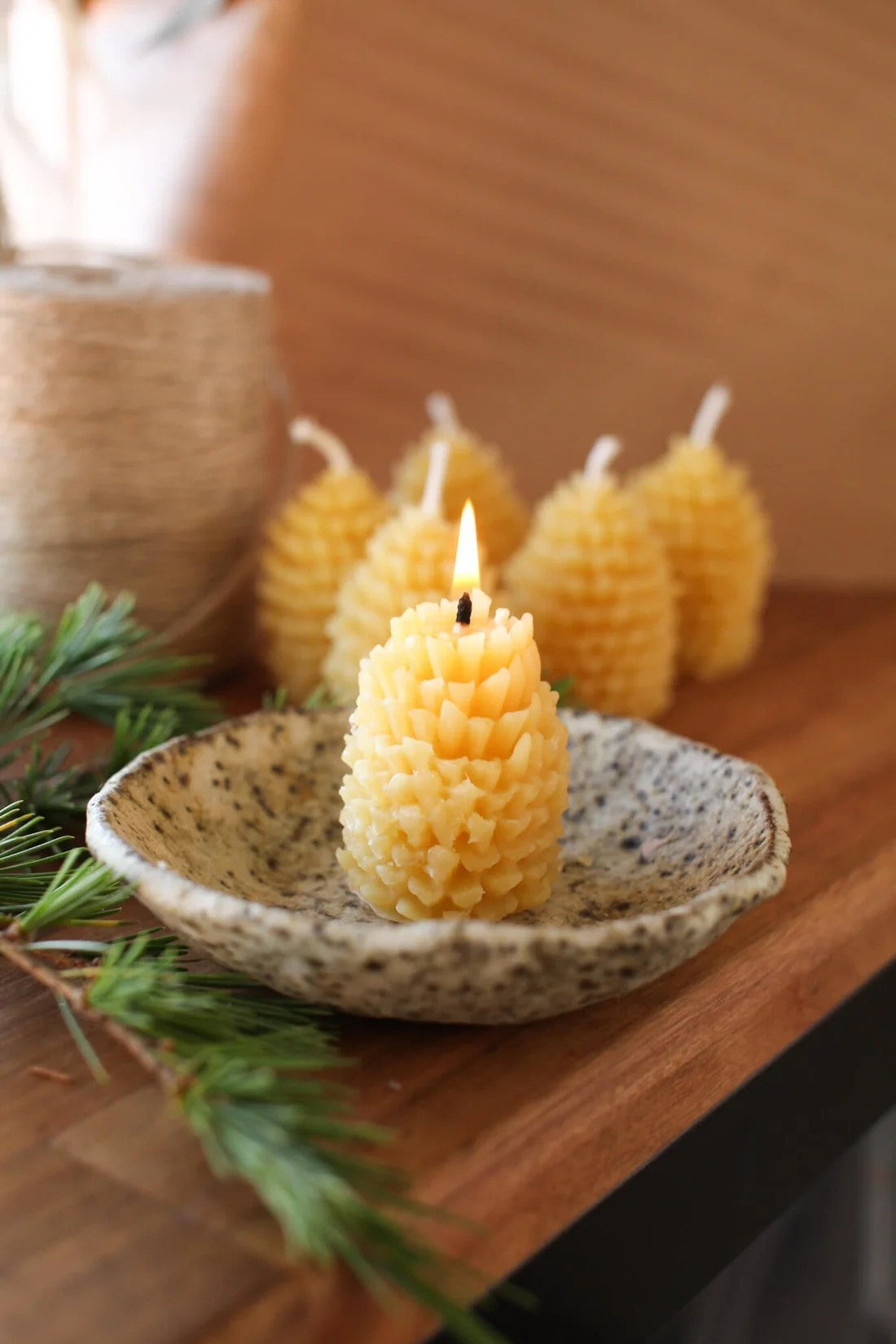 Beeswax pine cone candle