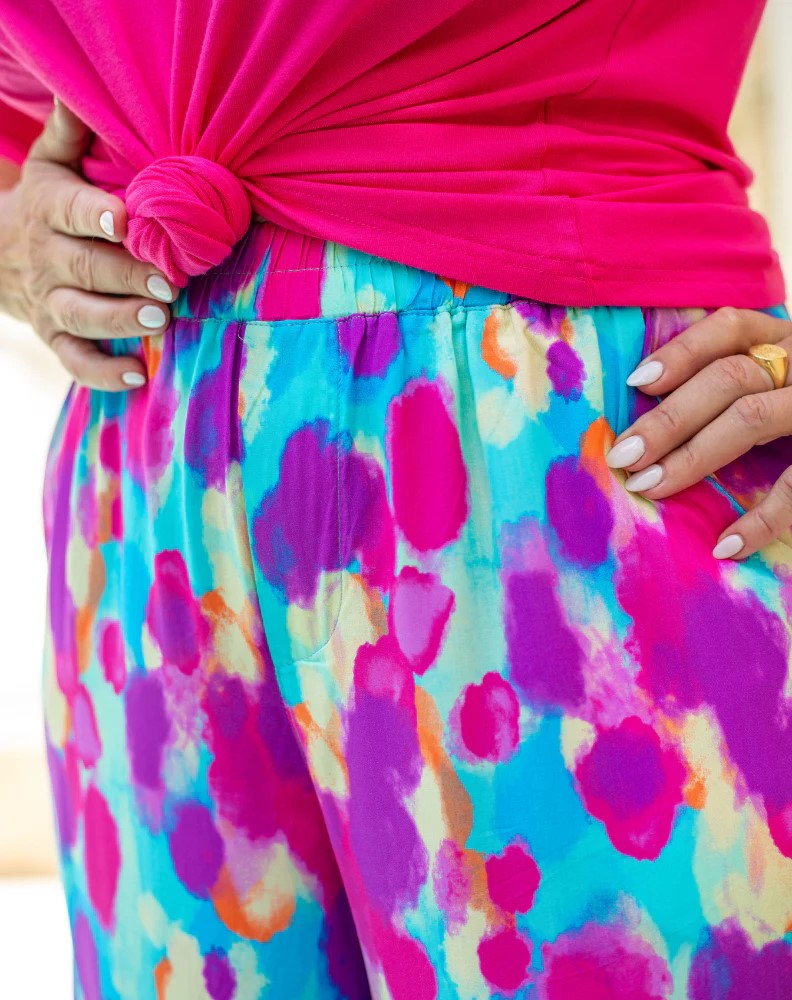 close up of bright coloured pants with stretchy waist band